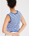 View of model wearing Amar Ceramic Blue Stripe Women's Sweater Tank.