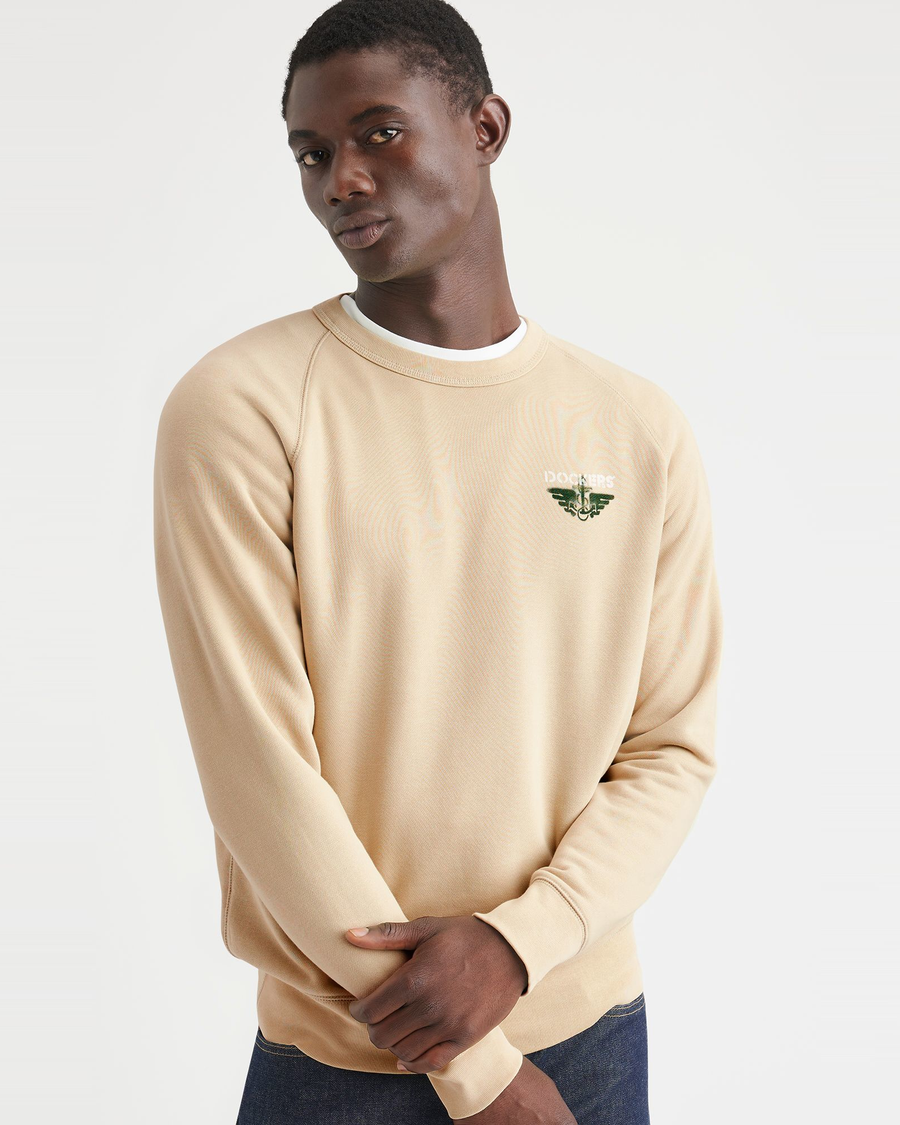 View of model wearing Apple Blossom Men's Regular Fit Icon Crewneck Sweatshirt.