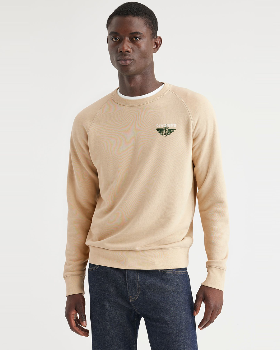 Front view of model wearing Apple Blossom Men's Regular Fit Icon Crewneck Sweatshirt.