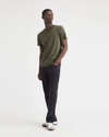 View of model wearing Army Green Men's Slim Fit Icon Tee Shirt.