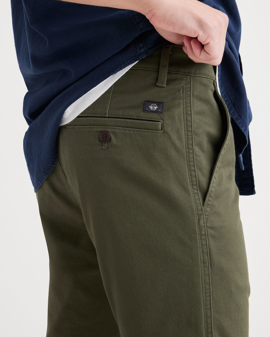View of model wearing Army Green Men's Slim Fit Original Chino Pants.