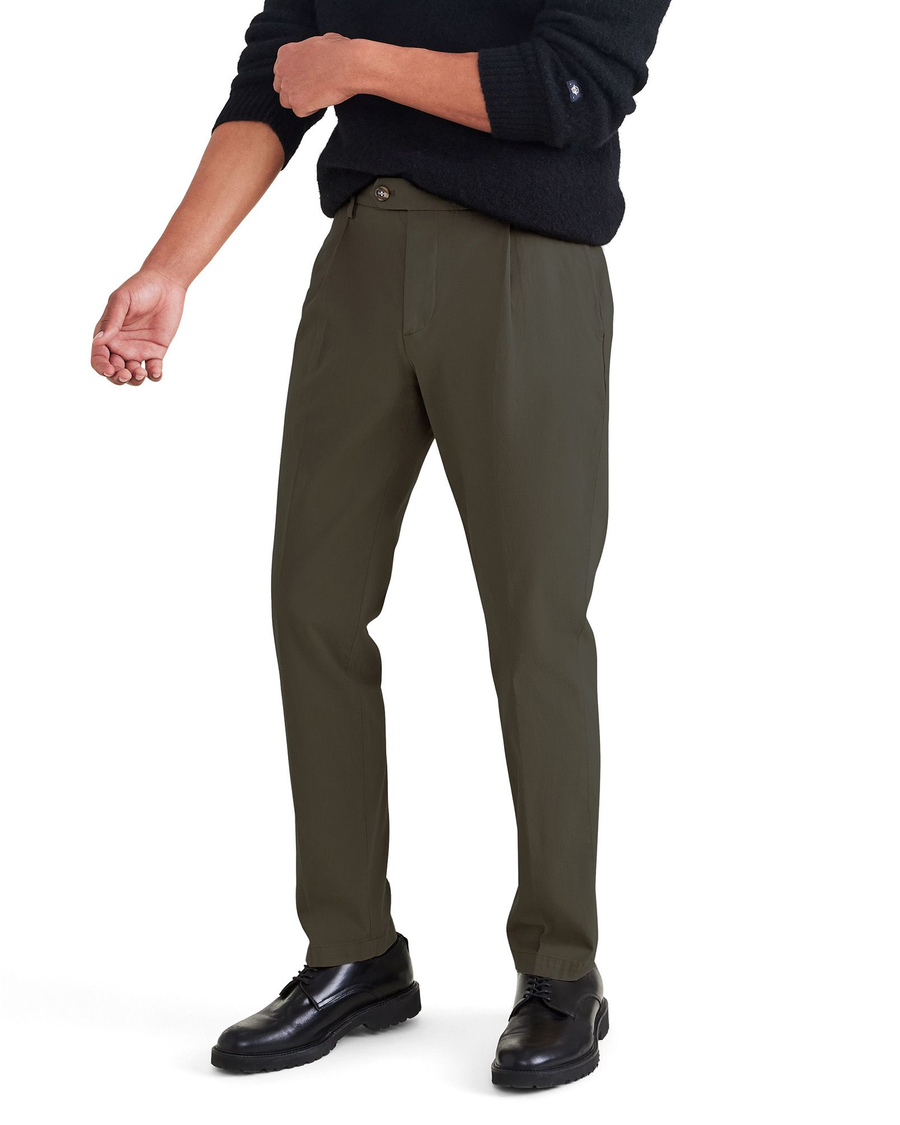 Front view of model wearing Army Green Men's Slim Tapered Fit Crafted Pants.