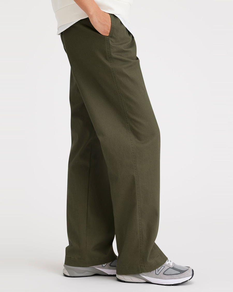 Side view of model wearing Army Green Women's Straight Fit Original Pleated High Wide Khaki Pants.