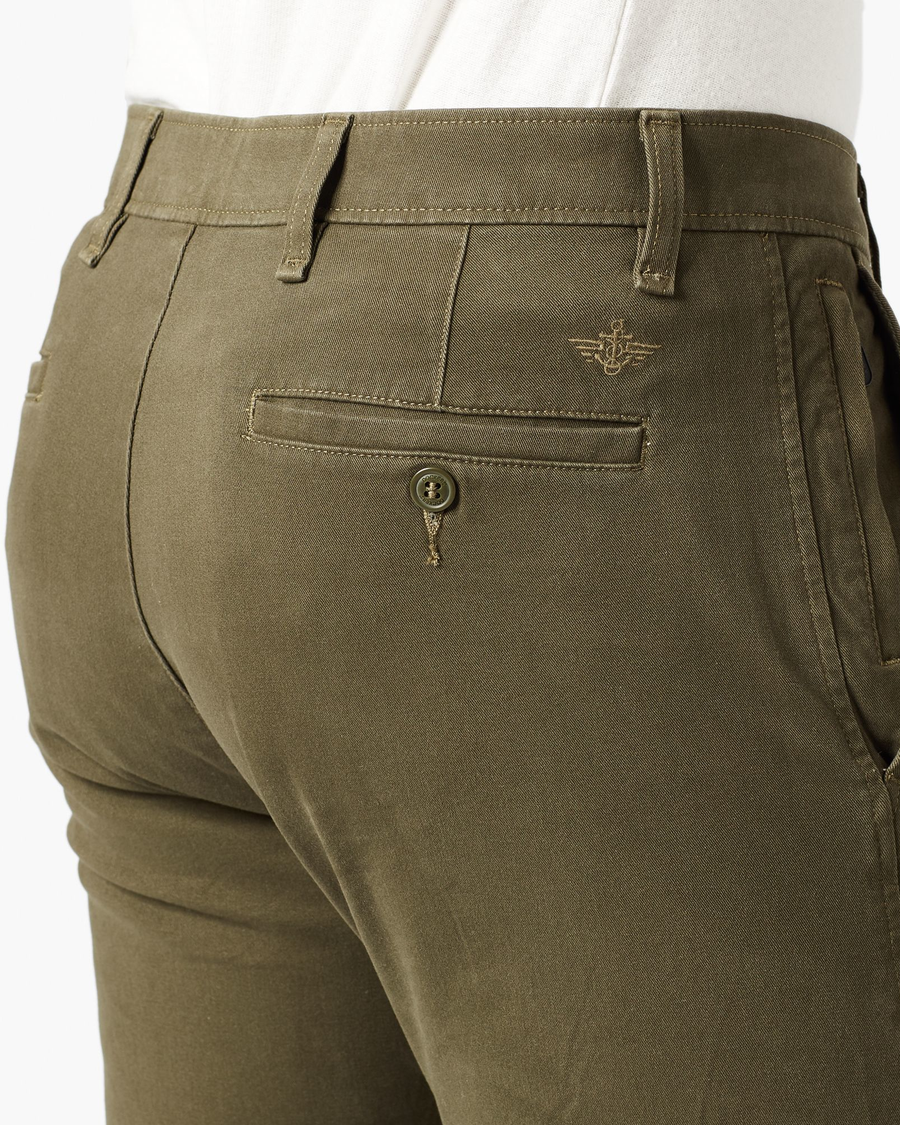 View of model wearing Army Olive Men's Slim Fit Smart 360 Flex Ultimate Chino Pants.