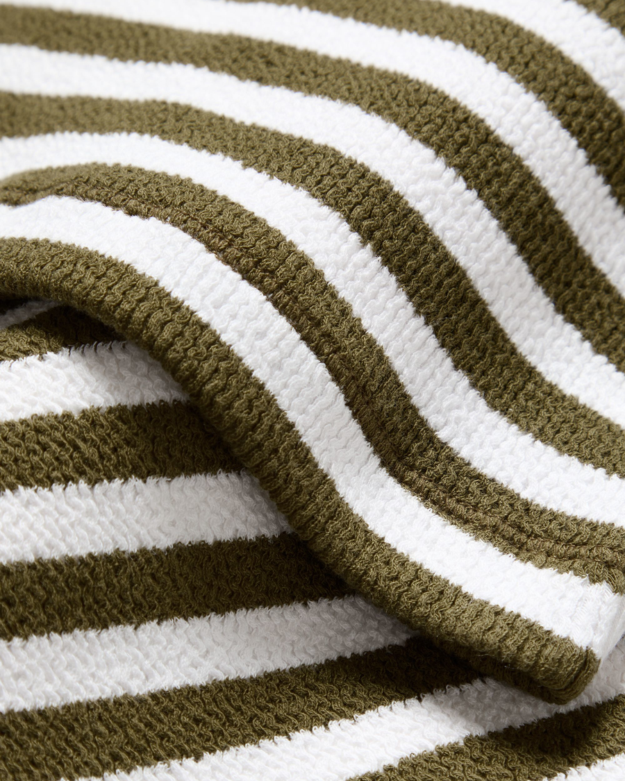 View of model wearing Avocado Rib Tank, Slim Fit.