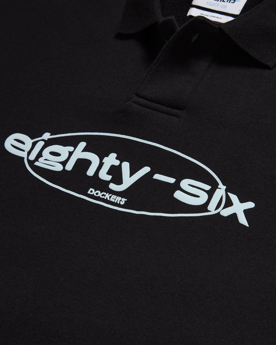 View of model wearing Beautiful Black Eighty-Six Collared Sweatshirt, Relaxed Fit.