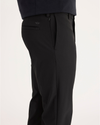 Side view of model wearing Beautiful Black Go Chino, Slim Fit with Airweave.