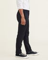 Side view of model wearing Beautiful Black Men's Slim Fit Original Chino Pants.