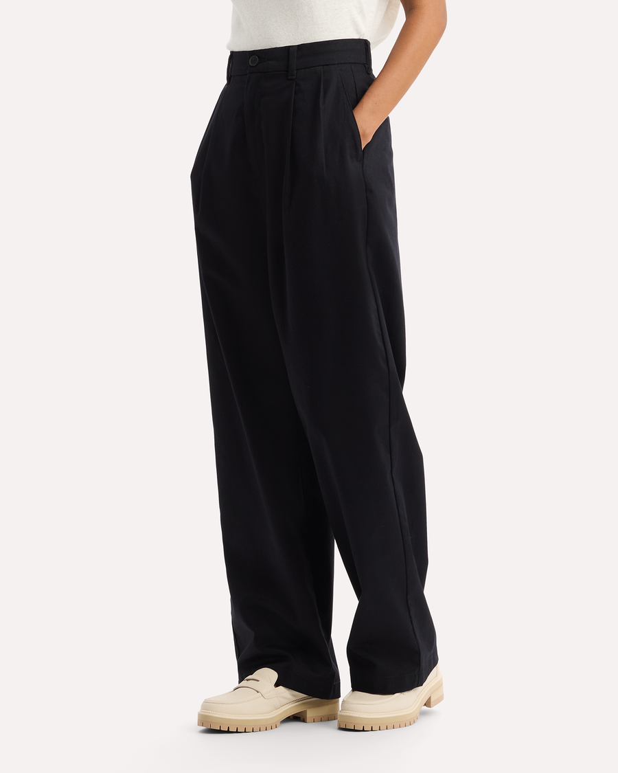 View of model wearing Beautiful Black Signature Iron Free Khakis, High Wide with Stain Defender®.