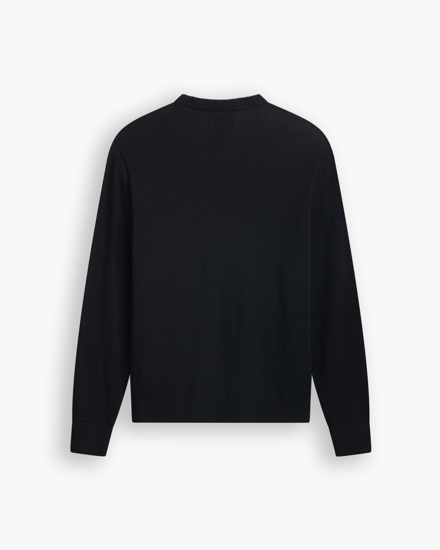 View of model wearing Beautiful Black V Neck Sweater.