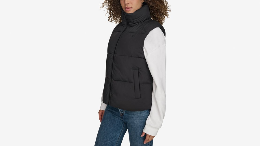 View of model wearing Beautiful Black Women's Puffer Vest Jacket.