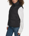 View of model wearing Beautiful Black Women's Puffer Vest Jacket.