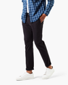 Front view of model wearing Black Ultimate Chinos, Skinny Fit.