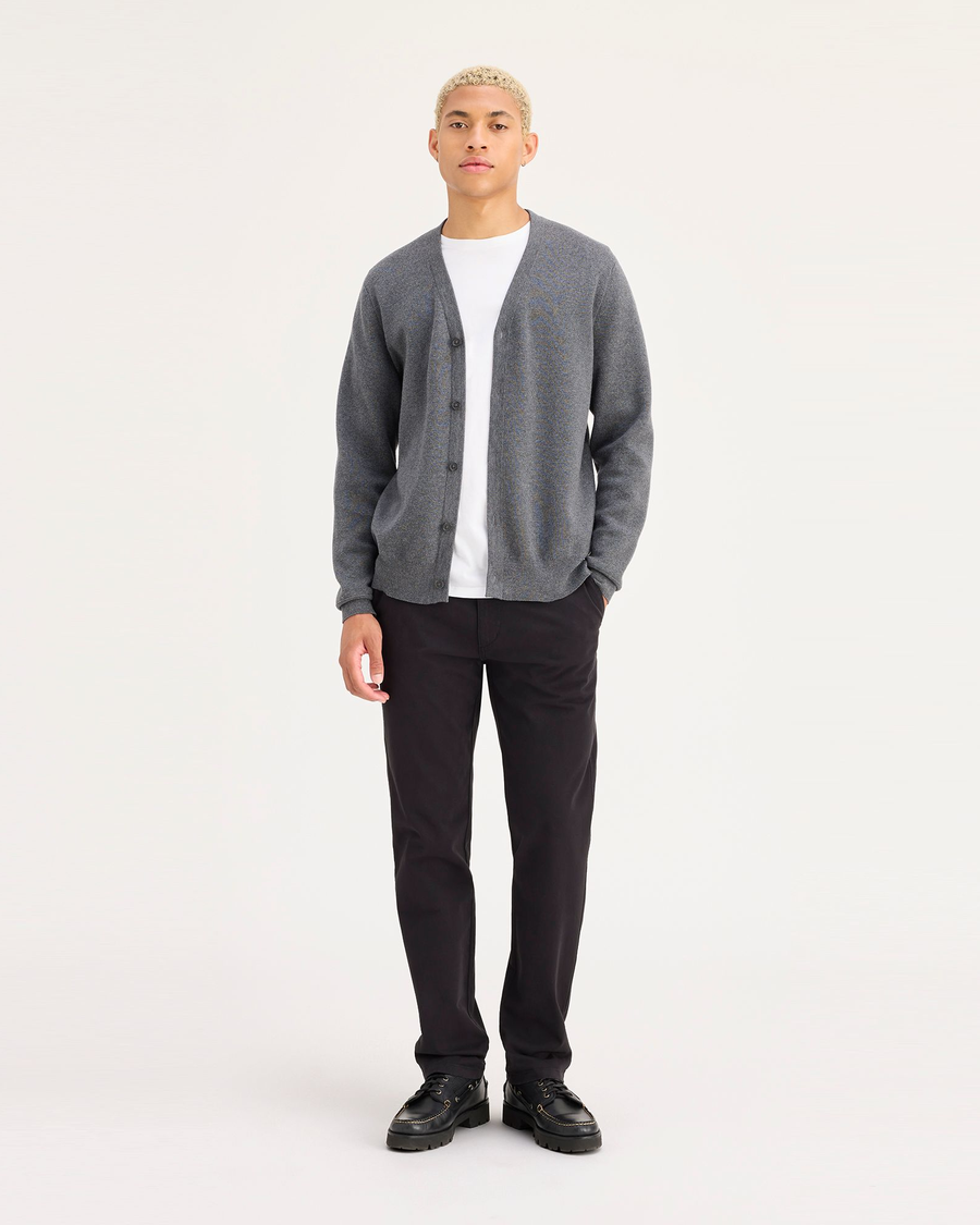 Front view of model wearing Black Ultimate Chinos, Slim Fit.