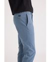 Side view of model wearing Bluefin Alpha Chino Pants, Skinny Fit.