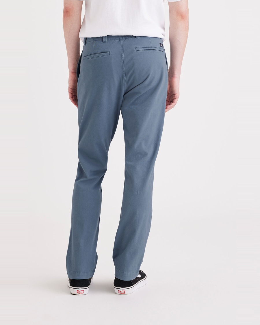 Back view of model wearing Bluefin Alpha Chino Pants, Slim Fit.