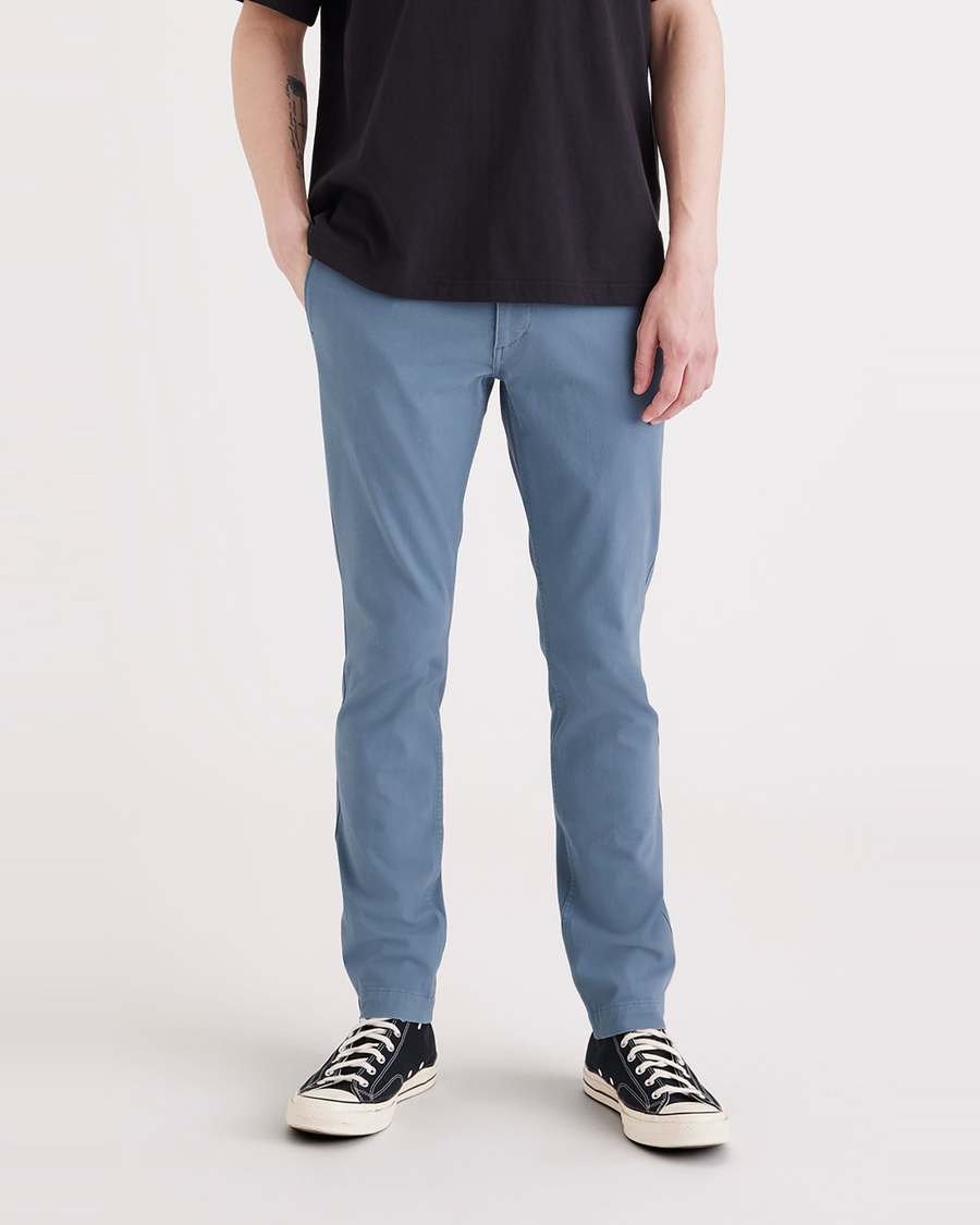 Front view of model wearing Bluefin Men's Skinny Fit Smart 360 Flex California Chino Pants.