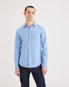 Front view of model wearing Bluefin Men's Slim Fit Icon Button Up Shirt.