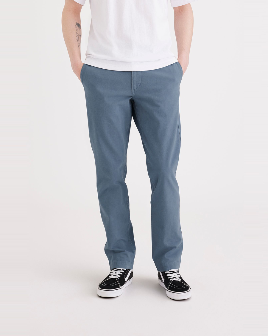 Front view of model wearing Bluefin Men's Slim Fit Smart 360 Flex California Chino Pants.