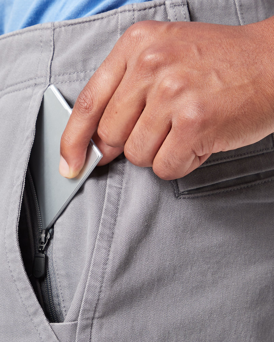 View of model wearing Burma Grey Men's Slim Fit Smart 360 Flex Alpha Khaki Pants.