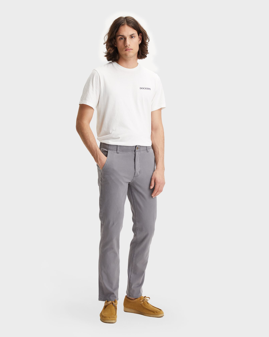 Front view of model wearing Burma Grey Men's Slim Fit Smart 360 Flex Alpha Khaki Pants.