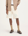 Front view of model wearing Buttercream Men's Loose Fit Eighty-Six Dock 10" Shorts.