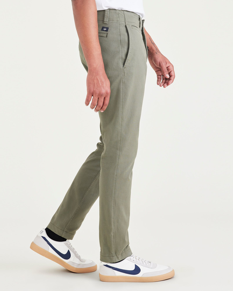 Side view of model wearing Camo Alpha Chino Pants, Skinny Fit.