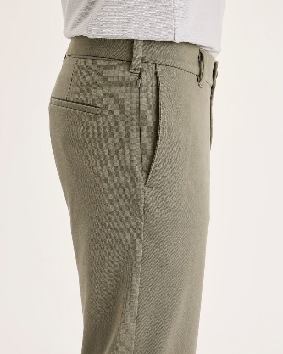 Side view of model wearing Camo Go Activeflex Chino, Slim Fit.