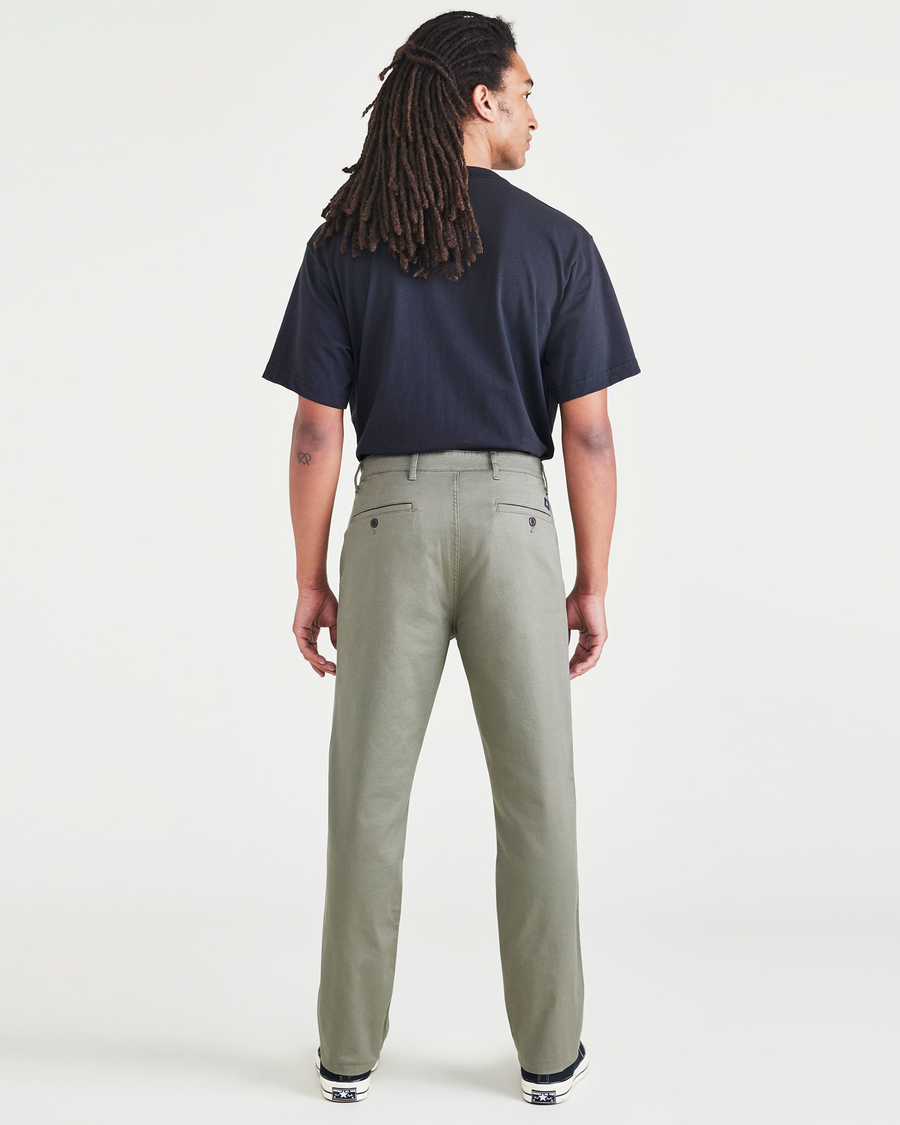 Back view of model wearing Camo Men's Slim Fit Original Chino Pants.