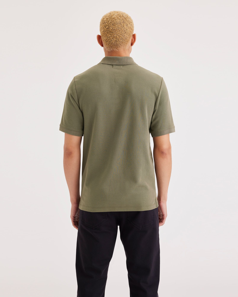 Back view of model wearing Camo Men's Slim Fit Original Polo Shirt.