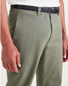 View of model wearing Camo Men's Slim Fit Smart 360 Flex California Chino Pants.