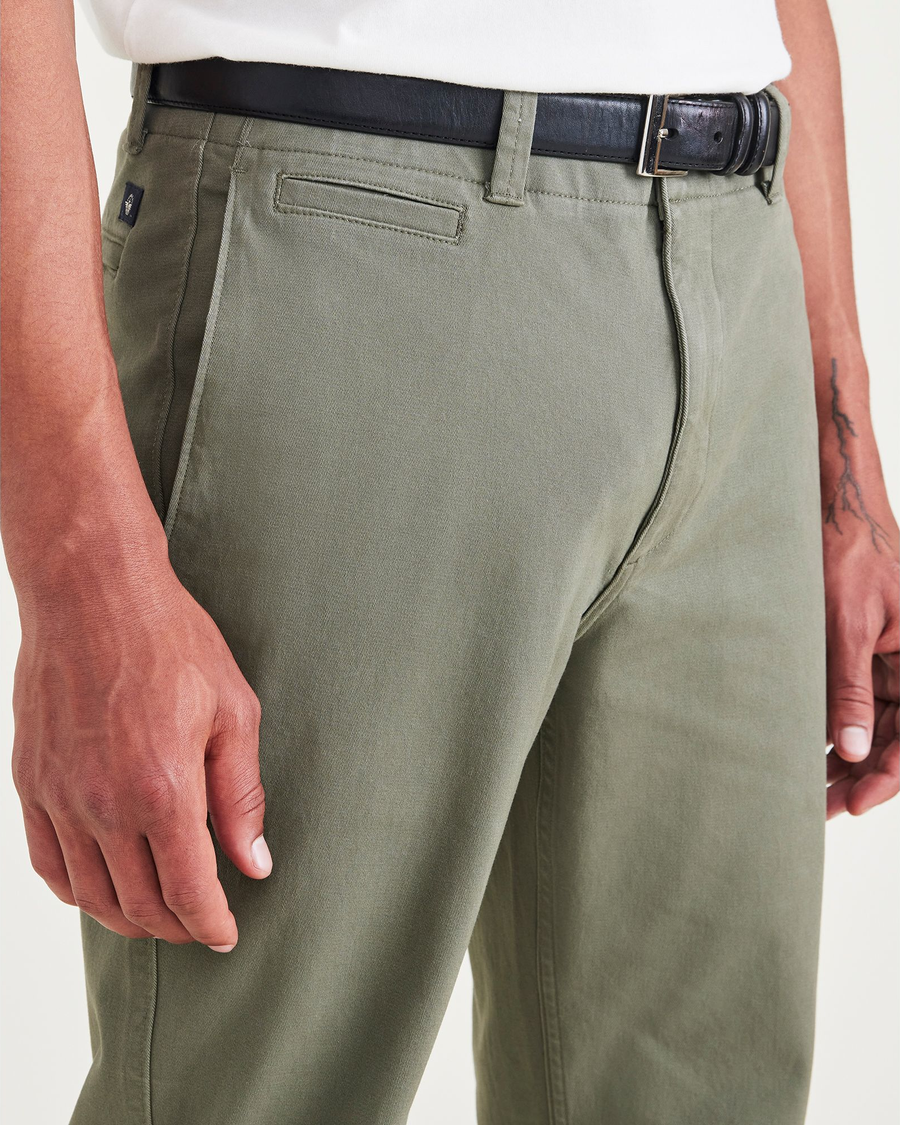 View of model wearing Camo Men's Slim Fit Smart 360 Flex California Chino Pants.