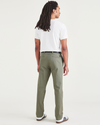 Back view of model wearing Camo Men's Slim Fit Smart 360 Flex California Chino Pants.