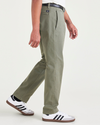 Side view of model wearing Camo Men's Slim Fit Smart 360 Flex California Chino Pants.