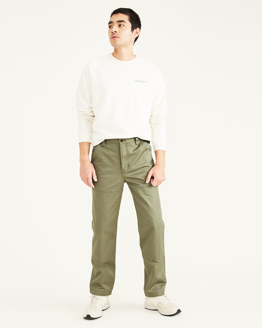 Front view of model wearing Camo Men's Straight Fit Utility Pants.