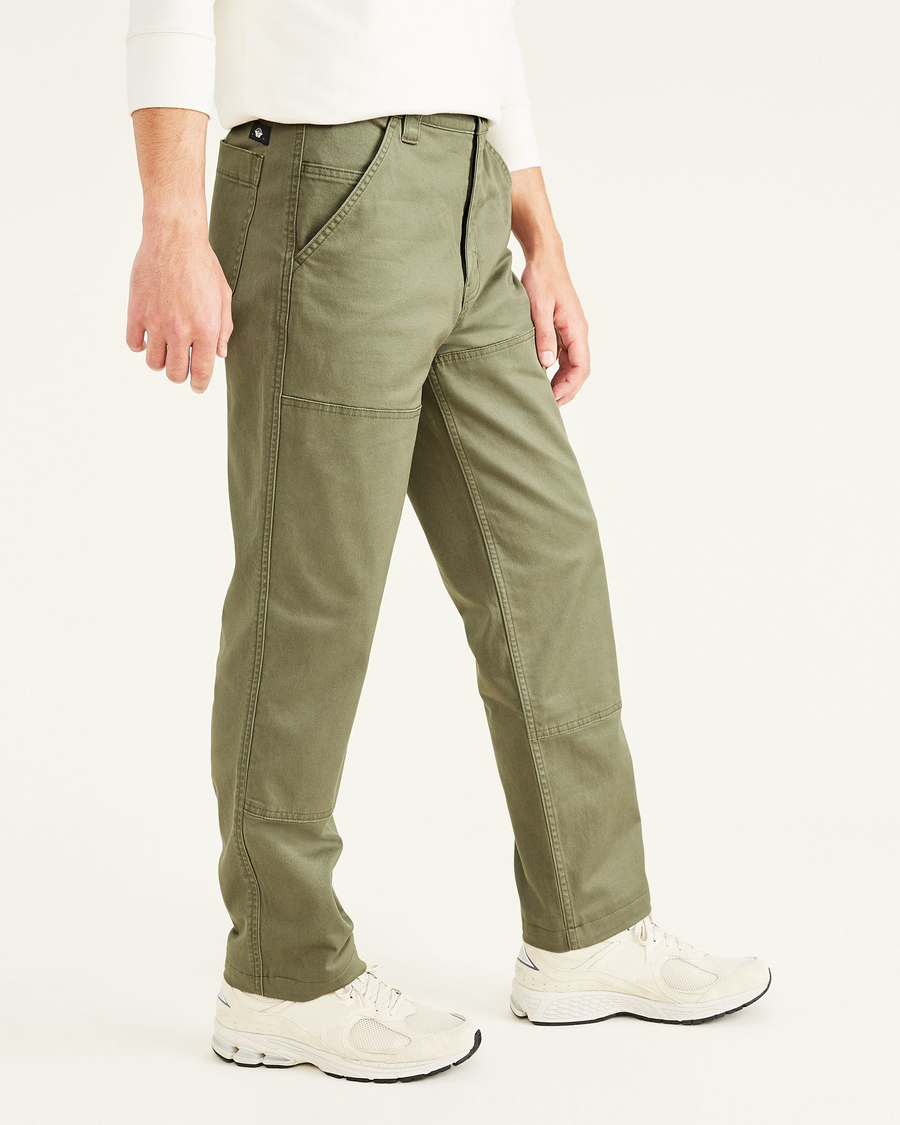Side view of model wearing Camo Men's Straight Fit Utility Pants.