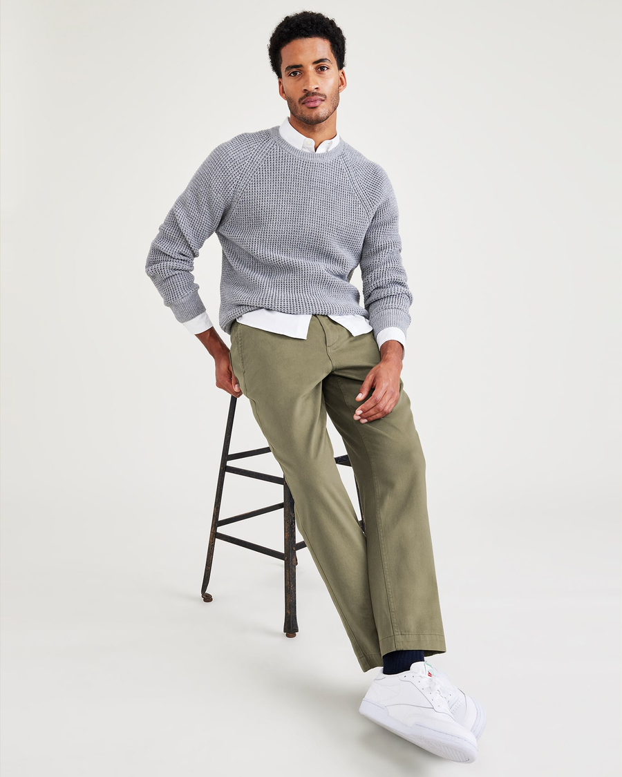 View of model wearing Camo Men's Straight Tapered Fit California Pull-On Pants.