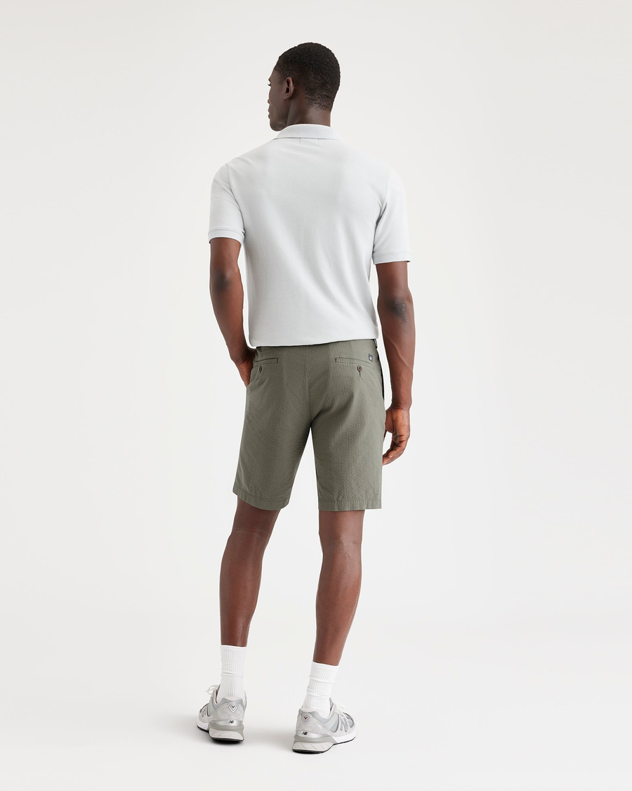 Back view of model wearing Camo Men's Supreme Flex Modern Chino Short.