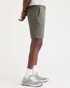 Side view of model wearing Camo Men's Supreme Flex Modern Chino Short.