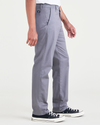 Side view of model wearing Car Park Grey Men's Slim Fit Original Chino Pants.
