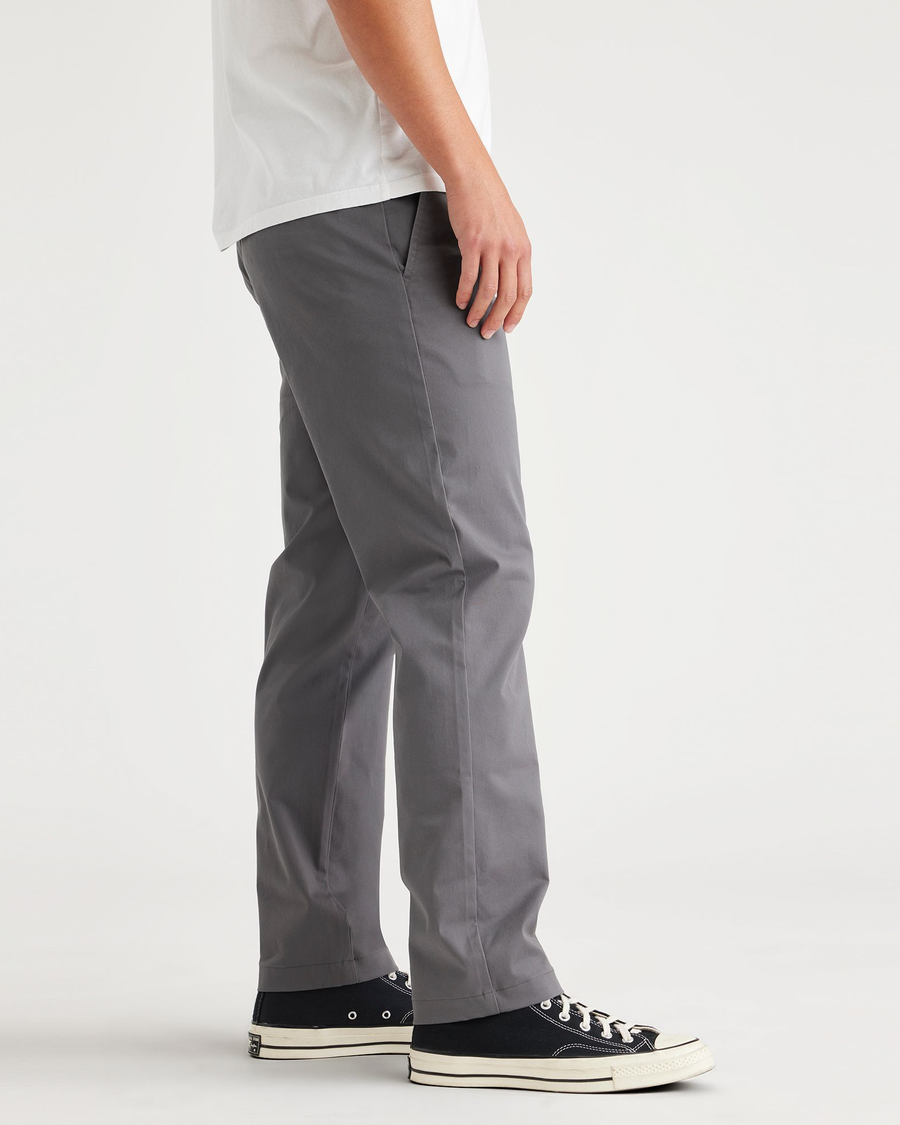 Side view of model wearing Car Park Grey Men's Slim Fit Original Chino.