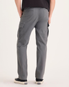 Back view of model wearing Car Park Grey Utility Cargo Pant, Straight Fit.
