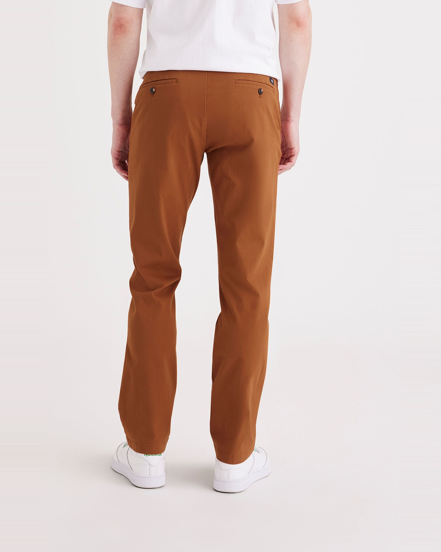 Back view of model wearing Caramel Café Crafted Khaki Pants, Slim Fit.