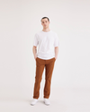 Front view of model wearing Caramel Café Crafted Khaki Pants, Slim Fit.