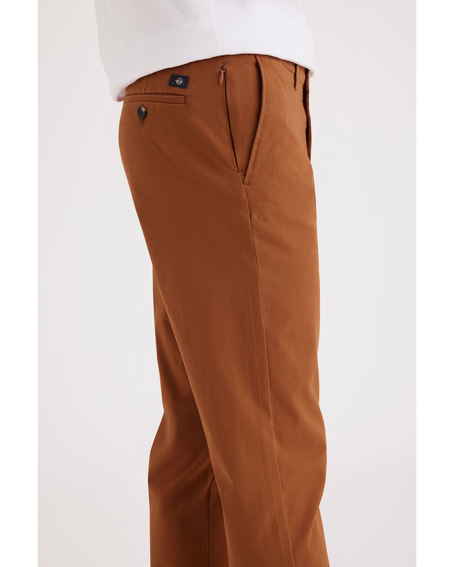 Side view of model wearing Caramel Café Crafted Khaki Pants, Slim Fit.