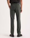 Back view of model wearing Chimera Crafted Khaki Pants, Slim Fit.