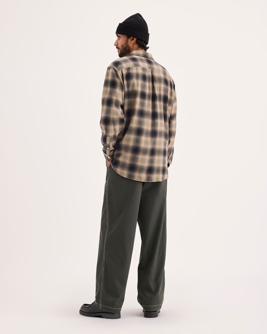 Back view of model wearing Chimera Eighty-Six Alpha Chino Pants, Loose Fit.