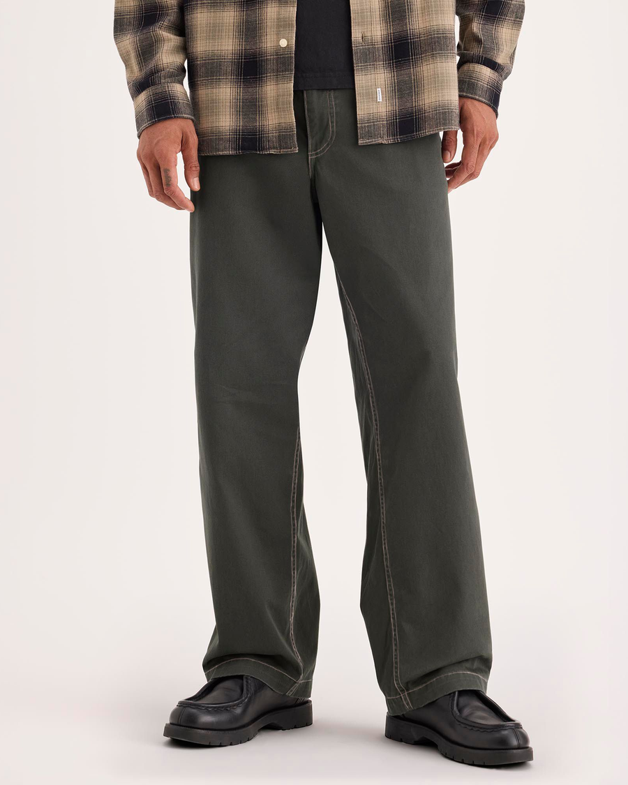 Front view of model wearing Chimera Eighty-Six Alpha Chino Pants, Loose Fit.