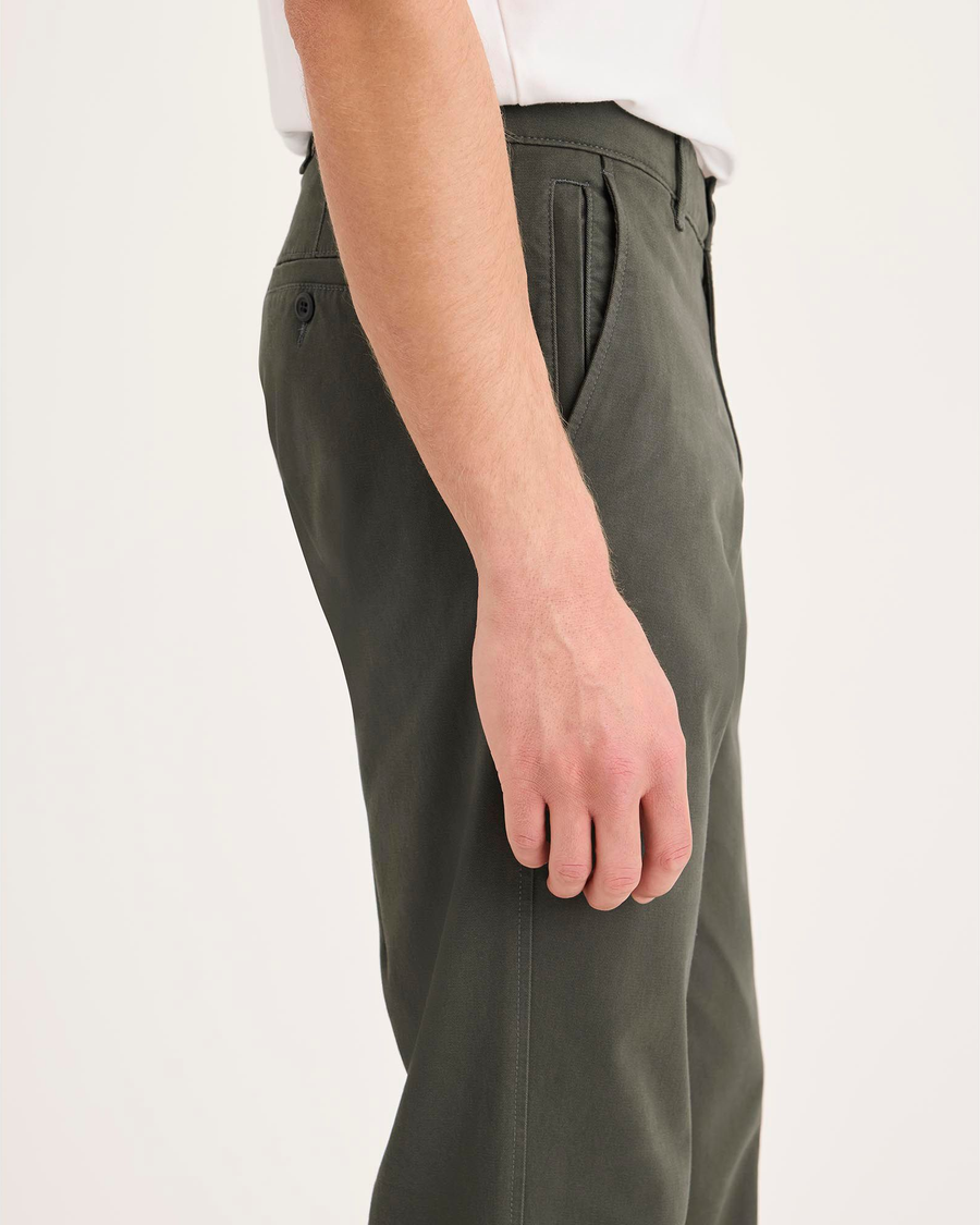 Side view of model wearing Chimera Ultimate Chinos, Slim Fit.
