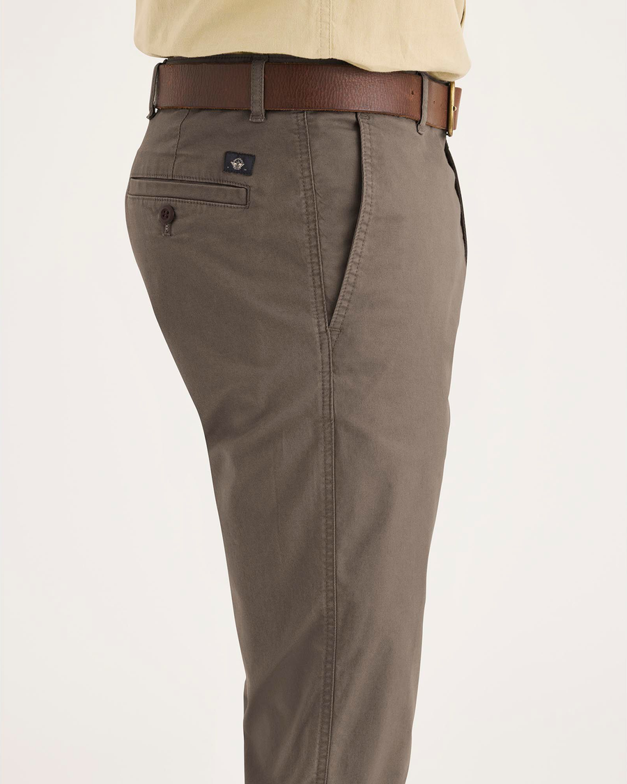 Side view of model wearing Chocolate Chip Original Chino Pants, Slim Fit.